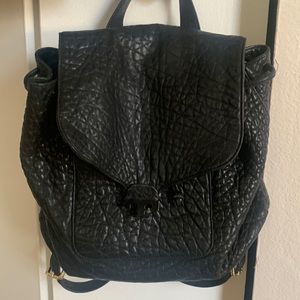 Drawstring Tory Burch. Great for a winter/fall outfit or traveling